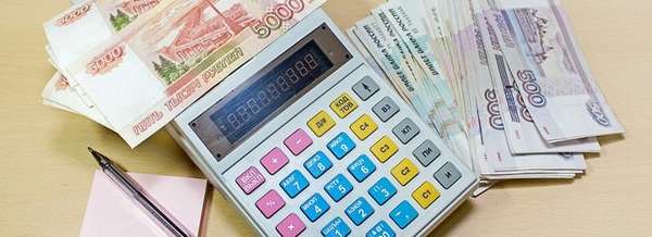 калькулятор, деньги, ручка - Как вернуть деньги за страховку по кредиту?